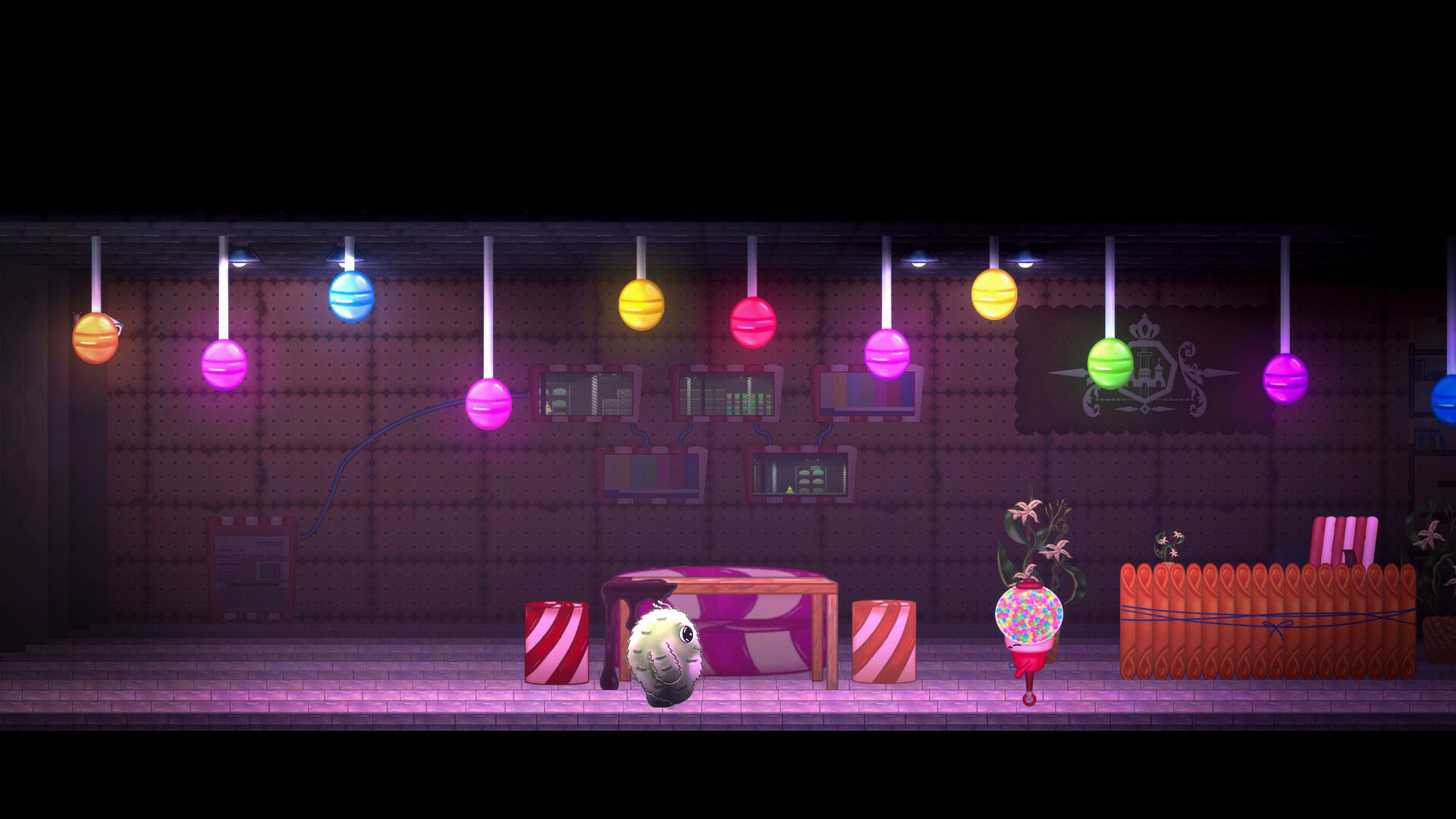 A factory corridor lit by hanging lollipop lamps.